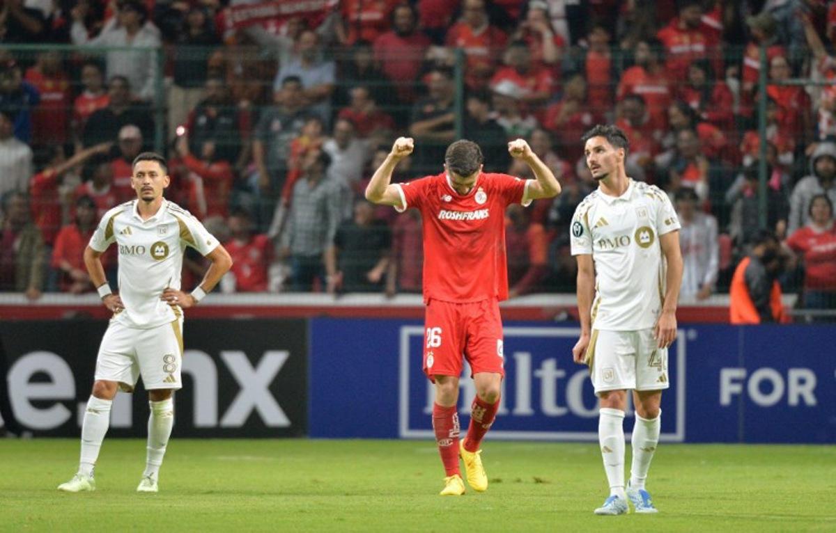 Toluca's Portuguese forward #26 Paulinho celebrates after scoring his team's fourth goal during the CONCACAF Champions Cup semifinal second leg football match between Mexico's Toluca and US' Los AngelesFC (LAFC) at the Nemesio Diaz stadium in Toluca, sate of Mexixo, Mexico on May 6, 2026. Mario Vazquez / AFP