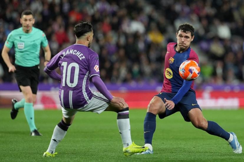 Real Valladolid's Spanish midfielder #10 Ivan Sanchez and Barcelona's Danish defender #15 Andreas Christensen vie for the ball during the Spanish league football match between Real Valladolid FC and FC Barcelona at the Jose Zorrilla stadium in Valladolid on May 3, 2025. Cesar Manso / AFP