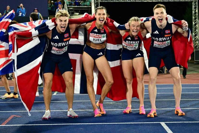 Gold medallists Norway's Andreas Ofstad Kulseng, Norway's Amalie Iuel Norway's Henriette Jaeger and Norway's Karsten Warholm celebrate after competing in the mixed 4x400m relay final during the European Athletics Championships at Alexander Stadium in Birmingham on August 10, 2026. Ben STANSALL / AFP