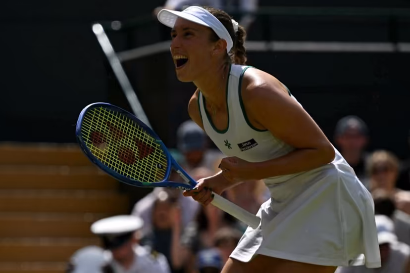Belgium's Elise Mertens celebrates winning against Kazakhstan's Elena Rybakina during their women's singles third round tennis match on the sixth day of the 2026 Wimbledon Championships at The All England Lawn Tennis and Croquet Club in Wimbledon, southwest London, on July 4, 2026. Glyn KIRK / AFP