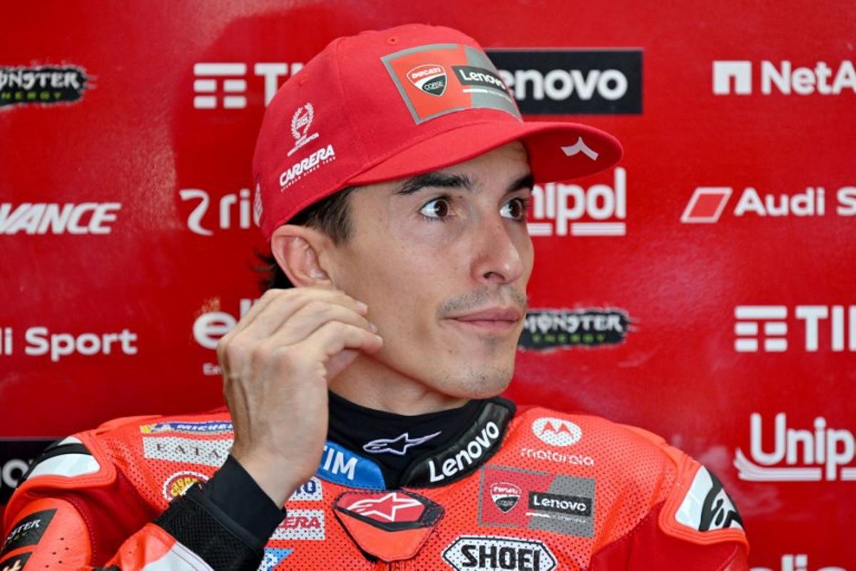 Ducati Lenovo Team's Spanish MotoGP rider Marc Marquez prepares for the free practice ahead of the MotoGP Indonesian Grand Prix at the Mandalika International Circuit in Mandalika, West Nusa Tenggara on October 3, 2025. SONNY TUMBELAKA / AFP