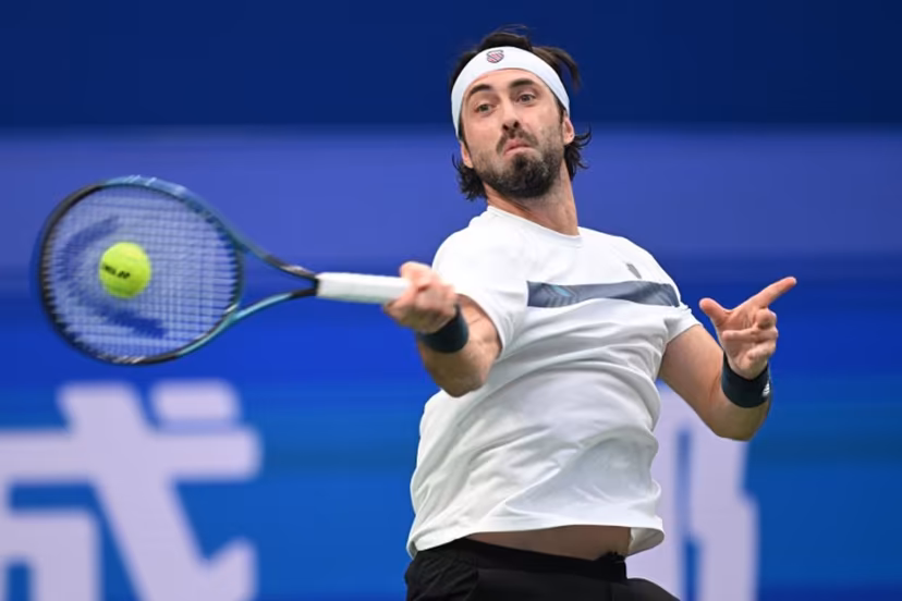 Georgia's Nikoloz Basilashvili hits a return to Spain's Alejandro Davidovich Fokina during their men's singles semi-final match at the Chengdu Open tennis tournament in Chengdu, in China's southwest Sichuan province on September 28, 2026. AFP