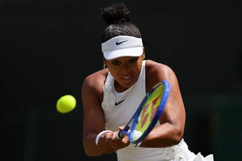 Japan's Naomi Osaka returns to Australia's Daria Kasatkina during their women's singles third round tennis match on the fifth day of the 2026 Wimbledon Championships at The All England Lawn Tennis and Croquet Club in Wimbledon, southwest London, on July 3, 2026. Adrian DENNIS / AFP