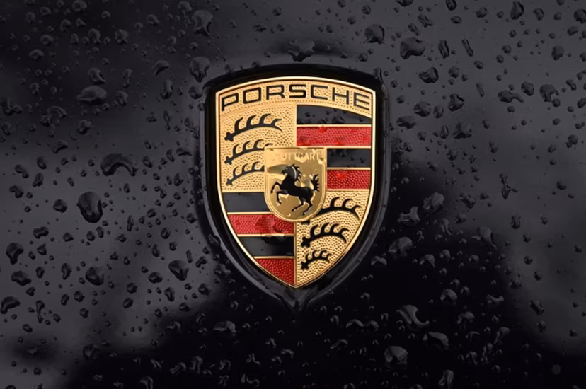This photographgraph taken on January 10, 2023 shows the logo of German car manufacturer Porsche, in Paris. Emmanuel DUNAND / AFP