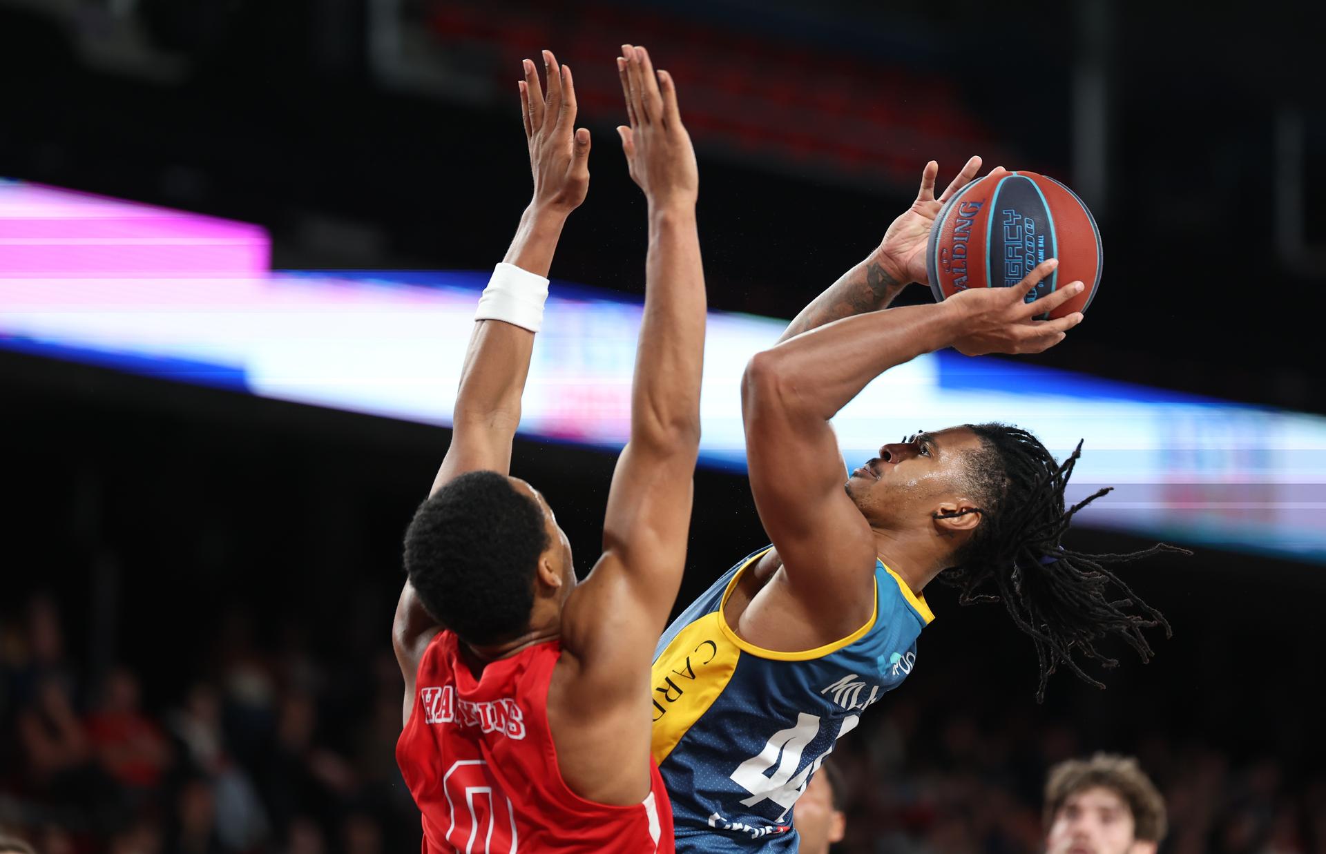Spirou's Nigel Hawkins and Oostende's Adam Miller fight for the ball during a basketball match between Spirou Charleroi and BC Oostende, Friday 23 October 2026 in Charleroi, on day 4 of the 'BNXT League' Belgian and Dutch first division basket championship. BELGA PHOTO VIRGINIE LEFOUR