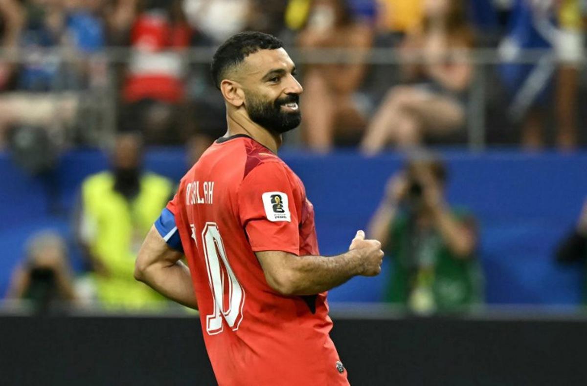 Egypt's forward #10 Mohamed Salah reacts after scoring in a penalty shoot-out during the 2026 World Cup round of 32 football match between Australia and Egypt at the Dallas Stadium in Arlington on July 3, 2026. Paul ELLIS / AFP