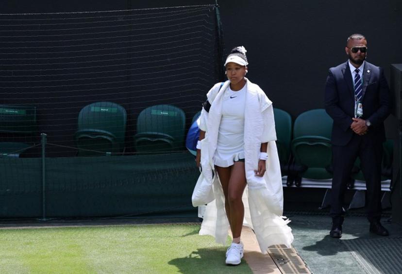 Japan's Naomi Osaka walks out before her women's singles third round tennis match against Australia's Daria Kasatkina on the fifth day of the 2026 Wimbledon Championships at The All England Lawn Tennis and Croquet Club in Wimbledon, southwest London, on July 3, 2026. Henry NICHOLLS / AFP