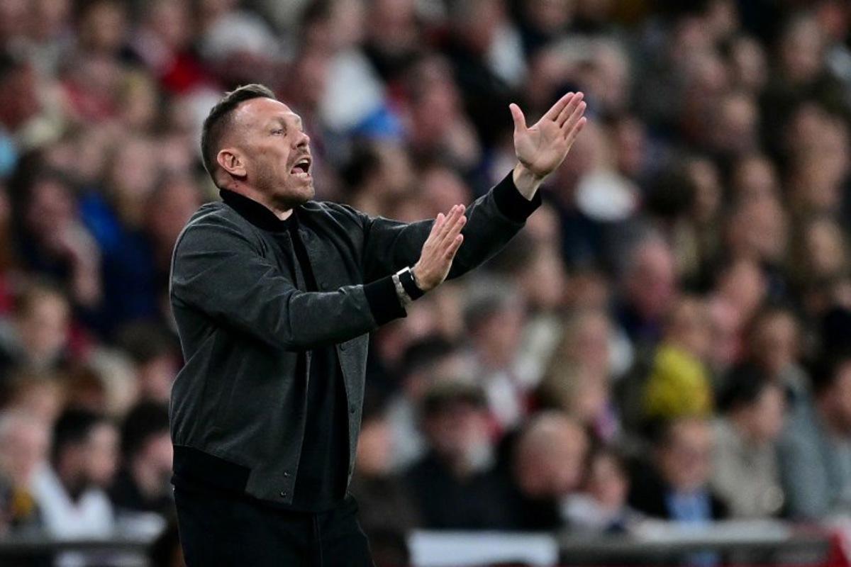 Wales' head coach Craig Bellamy shouts instructions to the players from the touchline during the friendly football match between England and Wales at Wembley Stadium in London on October 9, 2025. Ben STANSALL / AFP