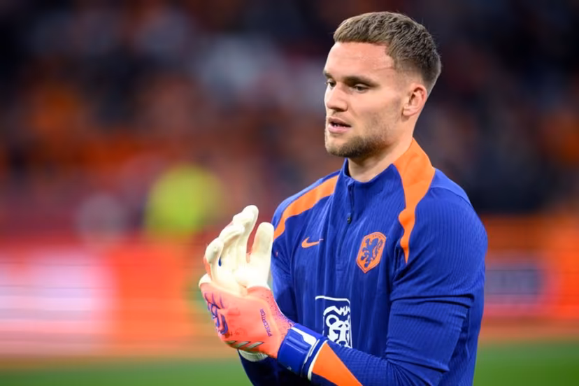 Netherlands' goalkeeper Bart Verbruggen looks on during warm up prior to the FIFA World Cup 2026 Group G European qualification football match between the Netherlands and Lithuania at the Johan Cruijff Arena, in Amsterdam, on November 17, 2025. JOHN THYS / AFP