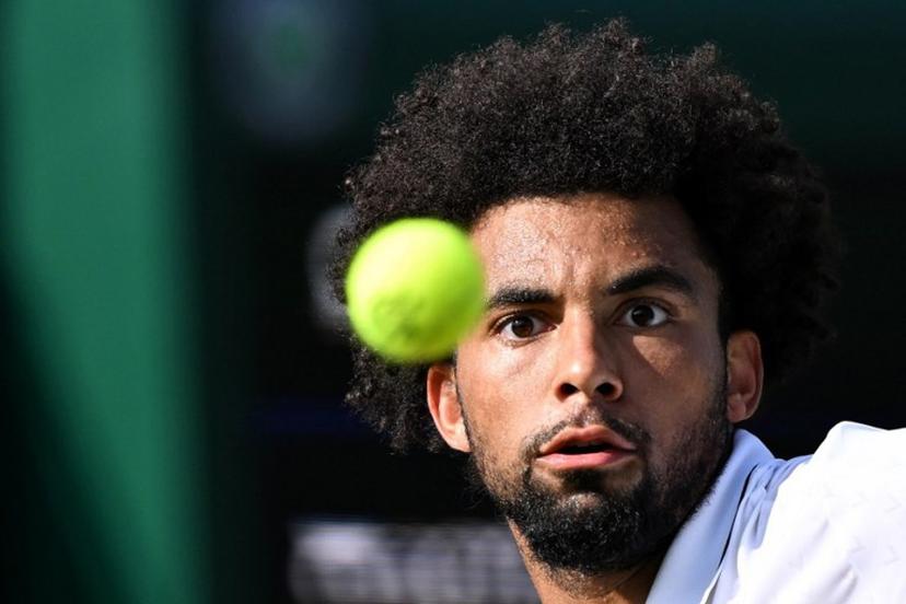 France's Arthur Fils focuses on the ball during their men's singles first round tennis match on the second day of the 2026 Wimbledon Championships at The All England Lawn Tennis and Croquet Club in Wimbledon, southwest London, on June 30, 2026. Kirill KUDRYAVTSEV / AFP