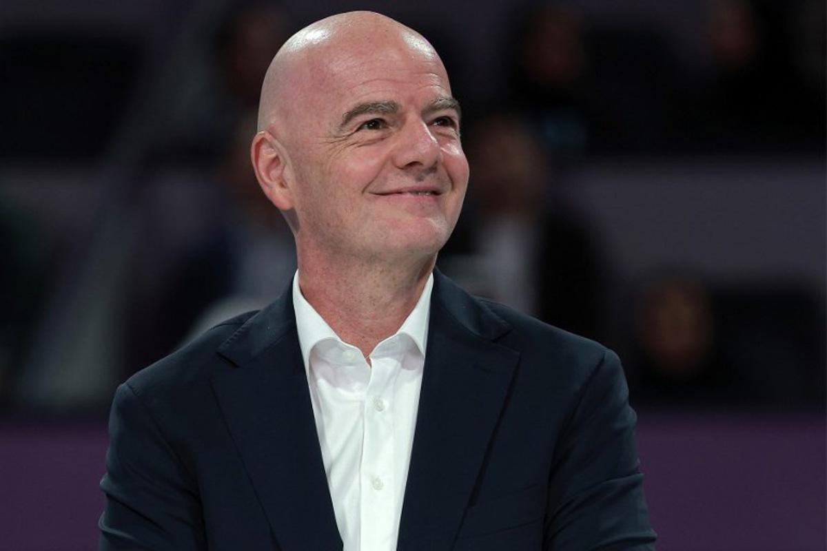 International Association Football Federation (FIFA) President Gianni Infantino looks on at the end of the women's singles final match, at the Qatar Open tennis tournament in Doha on February 14, 2026. Karim JAAFAR / AFP