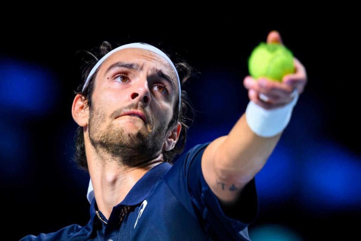 Italy's Lorenzo Musetti serves the ball to Germany's Alexander Zverev during the men's semi-final singles match at the ATP Vienna Open tennis tournament in Vienna, Austria, on October 25, 2025. MAX SLOVENCIK / APA / AFP