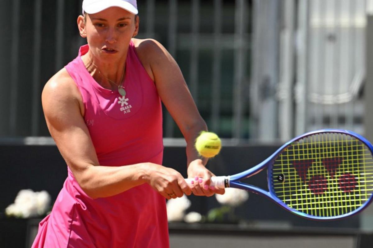 Belgium's Elise Mertens hits a return to Russia's Mira Andreeva during the WTA Rome Open tennis tournament at Foro Italico in Rome on May 11, 2026. Andreas SOLARO / AFP