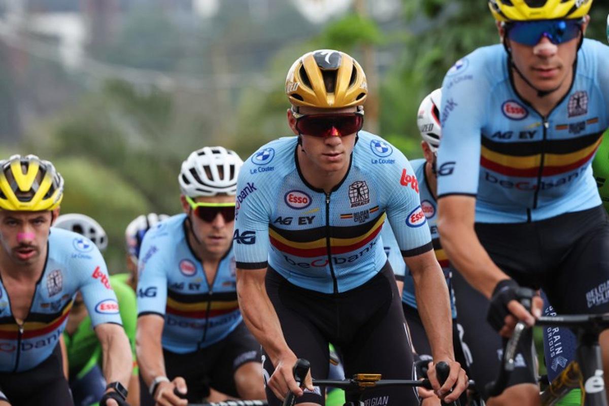 Belgian rider Remco Evenepoel (2nd R) competes in the men's Elite road race cycling event during the UCI 2025 Road World Championships, in Kigali, on September 28, 2025. Anne-Christine POUJOULAT / AFP