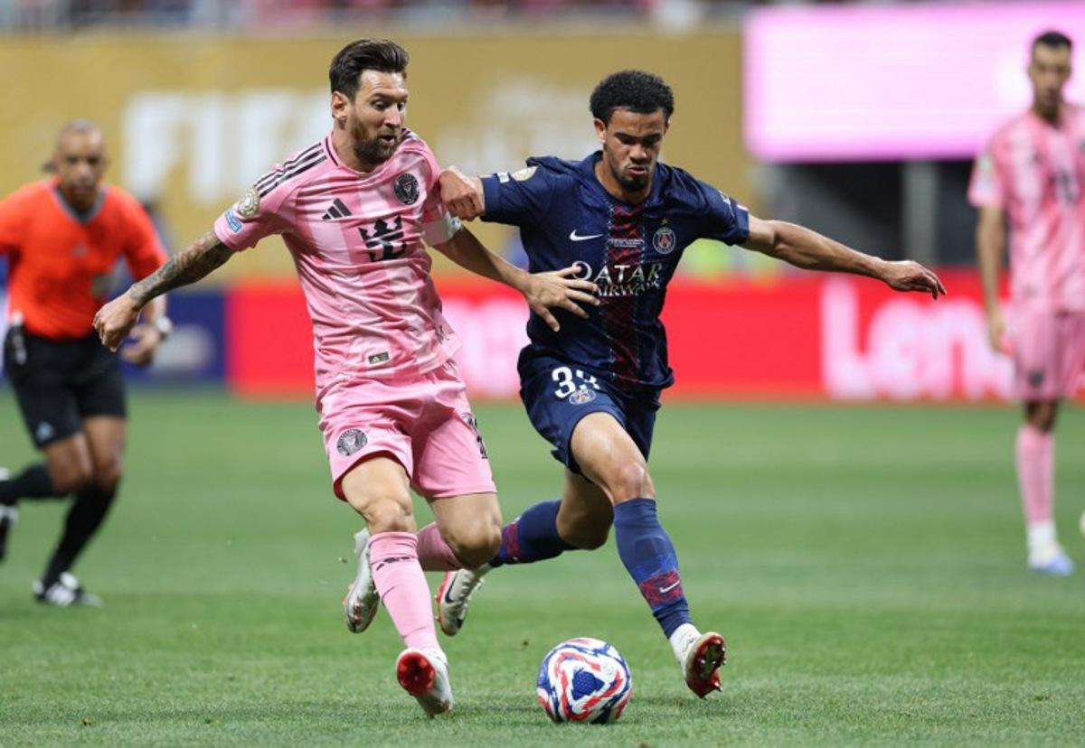 Inter Miami's Argentine forward #10 Lionel Messi and Paris Saint-Germain's French midfielder #33 Warren Zaire-Emery fight for the ball during the FIFA Club World Cup 2025 round of 16 football match between France's Paris Saint-Germain and US Inter Miami at the Mercedes-Benz Stadium in Atlanta on June 29, 2025. CHARLY TRIBALLEAU / AFP