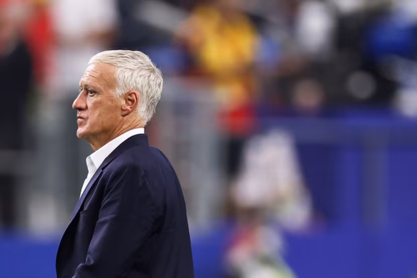 France's head coach Didier Deschamps leaves the pitch after losing the 2026 World Cup football tournament semi-final match between France and Spain at the Dallas Stadium in Arlington on July 14, 2026. FRANCK FIFE / AFP