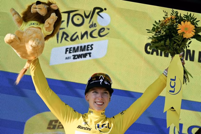 Yellow jersey of overall leader Team SD Worx-Protime's Dutch rider Lorena Wiebes poses on the podium after she won the first (out of 9) stage of the fifth edition of the Women's Tour de France cycling race, 138 km from Lausanne to Lausanne on August 1, 2026. NICOLAS TUCAT / AFP