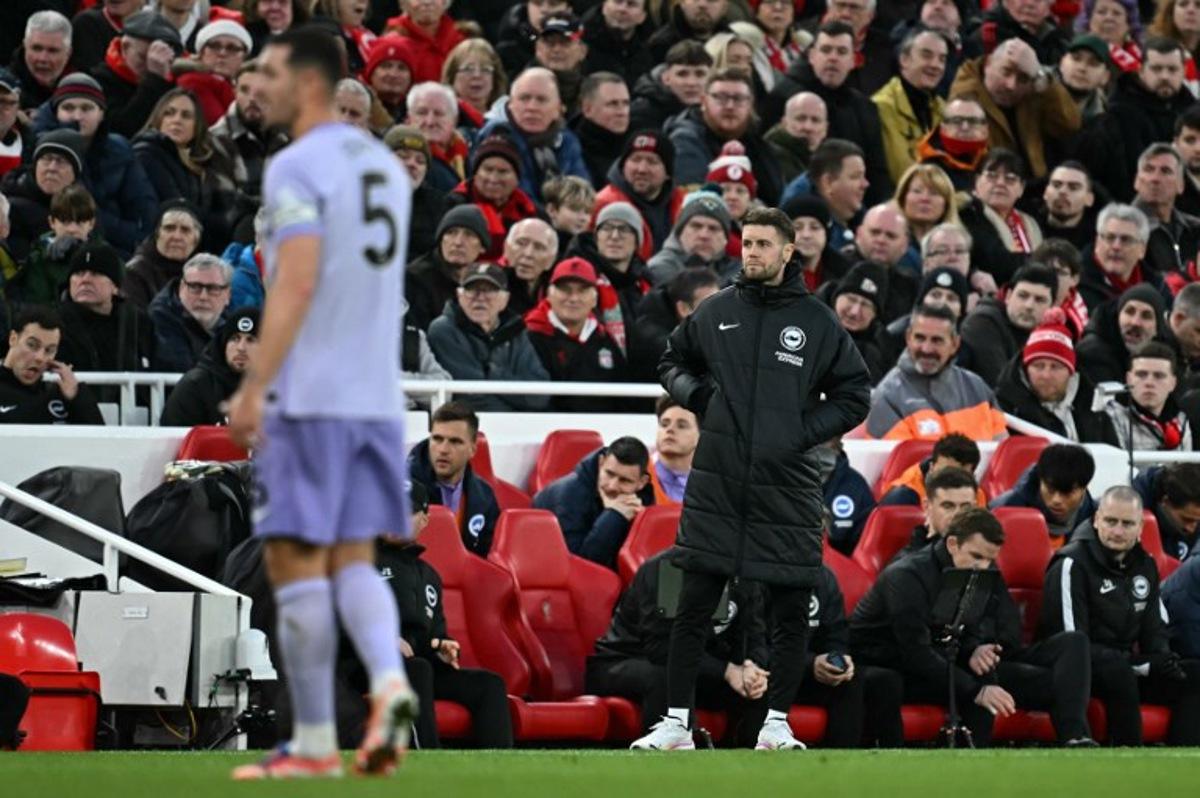 Brighton's German head coach Fabian Hurzeler reacts during the English Premier League football match between Liverpool and Brighton and Hove Albion at Anfield in Liverpool, north west England on December 13, 2025. Paul ELLIS / AFP