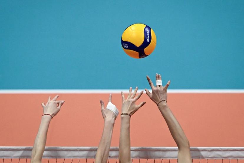 China's players attempt to block a ball in the women's gold medal volleyball event against Japan during the Hangzhou 2022 Asian Games in Hangzhou, in China's eastern Zhejiang province on Octorber 7, 2023. WANG Zhao / AFP