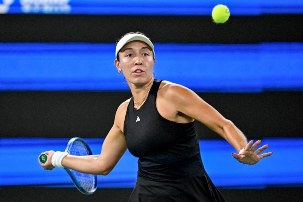 USA's Jessica Pegula hits a return to Belarus's Aryna Sabalenka during their women's singles semi-final match at the Wuhan Open tennis tournament in Wuhan, central China's Hubei province on October 11, 2025. Adek BERRY / AFP