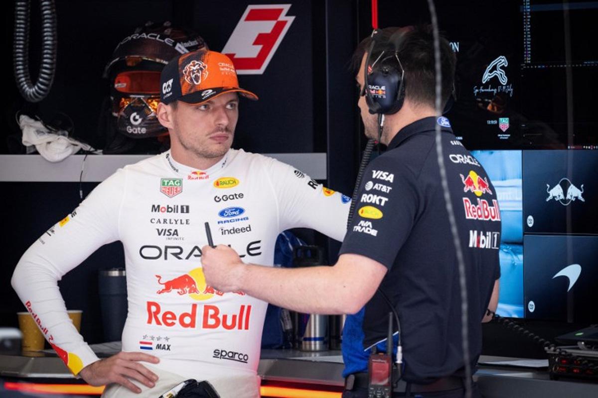 Red Bull Racing's Dutch driver Max Verstappen (L) speaks with a member of the team prior to the first practice session at the Spa-Francorchamps circuit, in Spa, ahead of the Formula One Belgian Grand Prix, on July 17, 2026. JOHN THYS / AFP