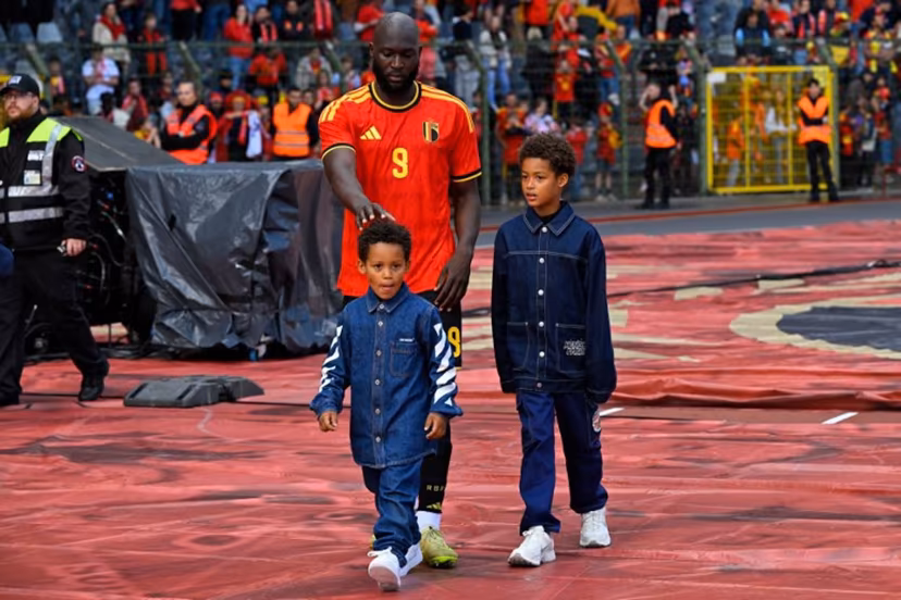 Belgium's forward #9 Romelu Lukaku walks around the stadium with his children after the international friendly football match between Belgium and Tunisia at the King Baudouin Stadium in Brussels on June 6, 2026. JOHN THYS / AFP
