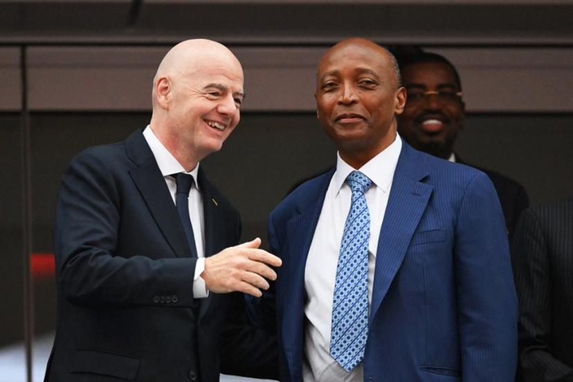 FIFA President Gianni Infantino (L) and Confederation of African Football (CAF) President Patrice Motsepe (R) talk ahead of the 2026 World Cup round of 32 football match between South Africa and Canada at the Los Angeles Stadium in Inglewood on June 28, 2026. Patrick T. Fallon / AFP