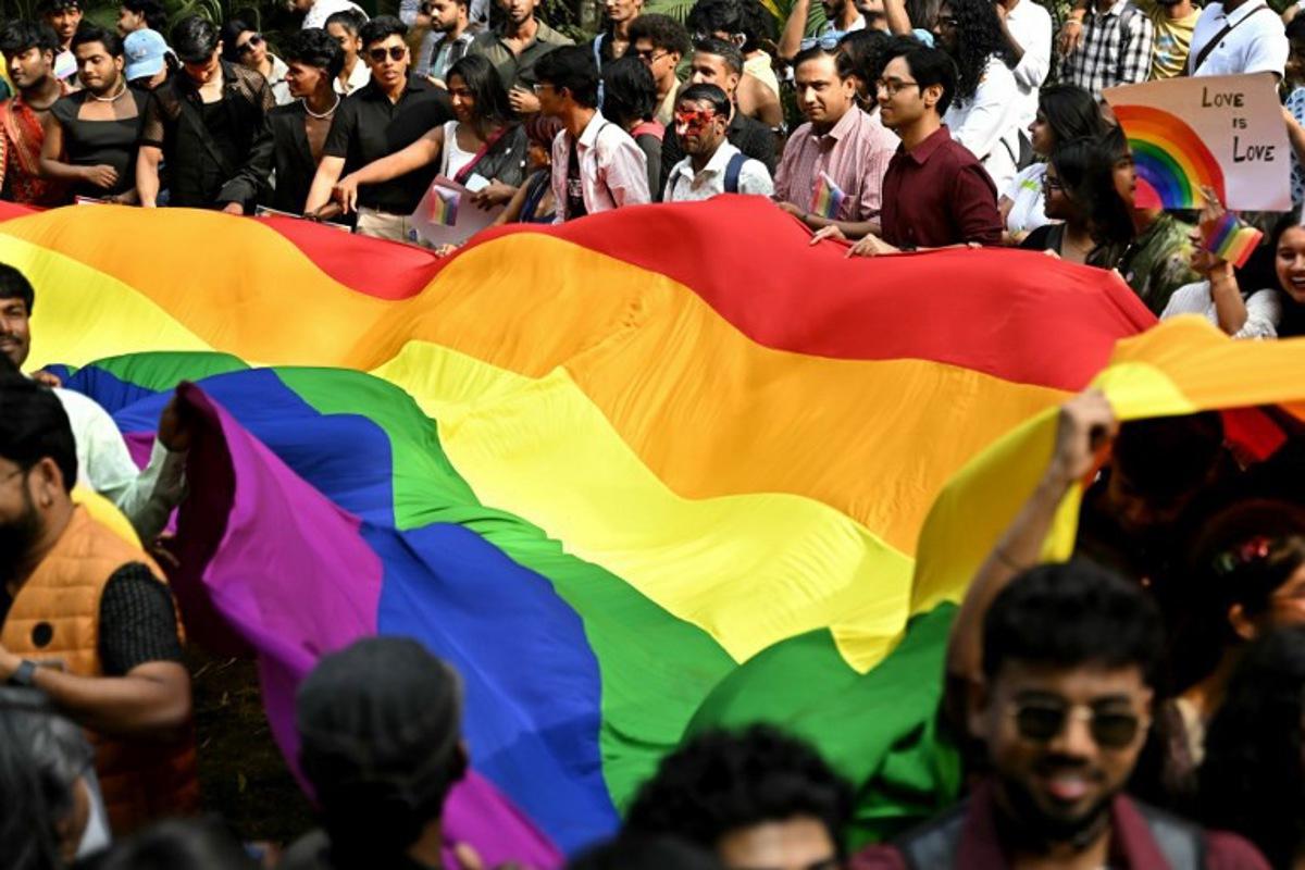 Activists and supporters of the LGBTQ community participate in the 'Pride Walk Bengaluru', a solidarity march held in Bengaluru on December 7, 2025. Idrees MOHAMMED / AFP