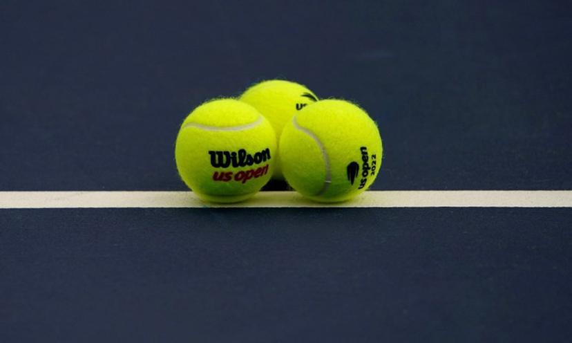 Tennis balls sit on the court during the first round of the 2022 US Open Tennis tournament at the USTA Billie Jean King National Tennis Center in New York, on August 29, 2022. TIMOTHY A. CLARY / AFP