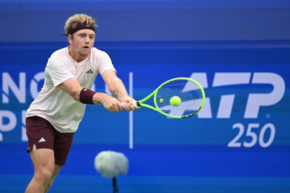 Spain's Alejandro Davidovich Fokina hits a return to Georgia's Nikoloz Basilashvili during their men's singles semi-final match at the Chengdu Open tennis tournament in Chengdu, in China's southwest Sichuan province on September 28, 2026. STR / AFP