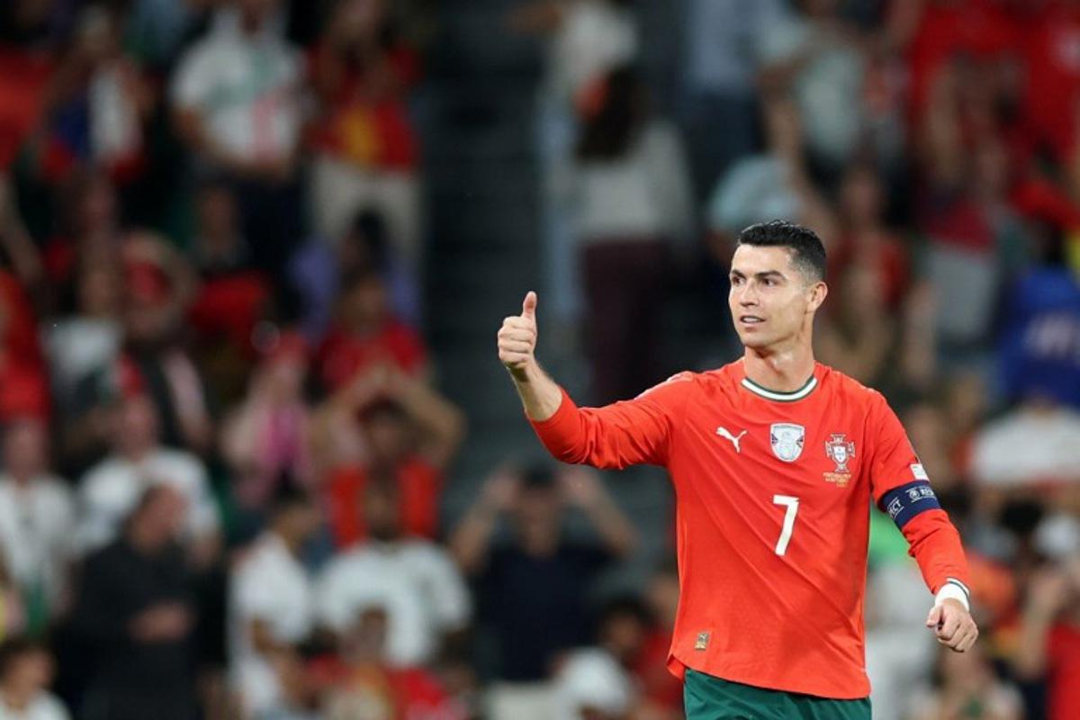 Portugal's forward #16 Cristiano Ronaldo celebrates scoring his team's second goal during the 2026 World Cup qualifiers Europe zone group F football match between Portugal and Hungary at Jose Alvalade stadium in Lisbon on October 14, 2025. PATRICIA DE MELO MOREIRA / AFP