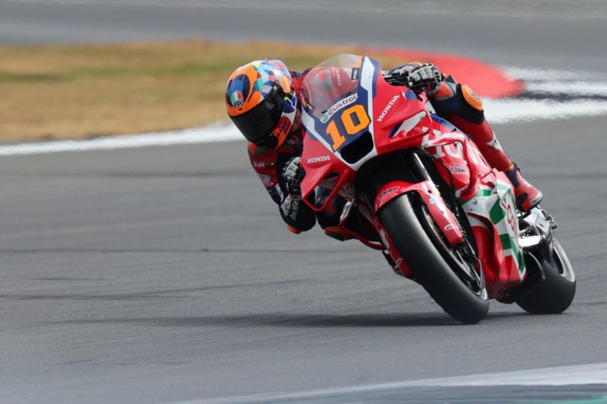 Honda HRC Castrol team's Italian MotoGP rider Luca Marini takes part in the sprint race of the MotoGP British Grand Prix at Silverstone circuit in Northamptonshire, central England, on May 24, 2025. Adrian Dennis / AFP
