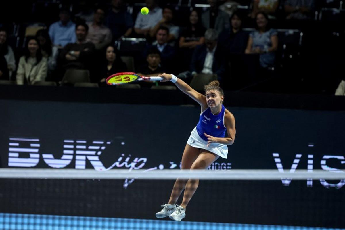 Italy's Jasmine Paolini hits a return to Ukraine's Elina Svitolina during their second singles semi-final match at the Billie Jean King Cup in Shenzhen, southern China's Guangdong province on September 19, 2025. STR / AFP