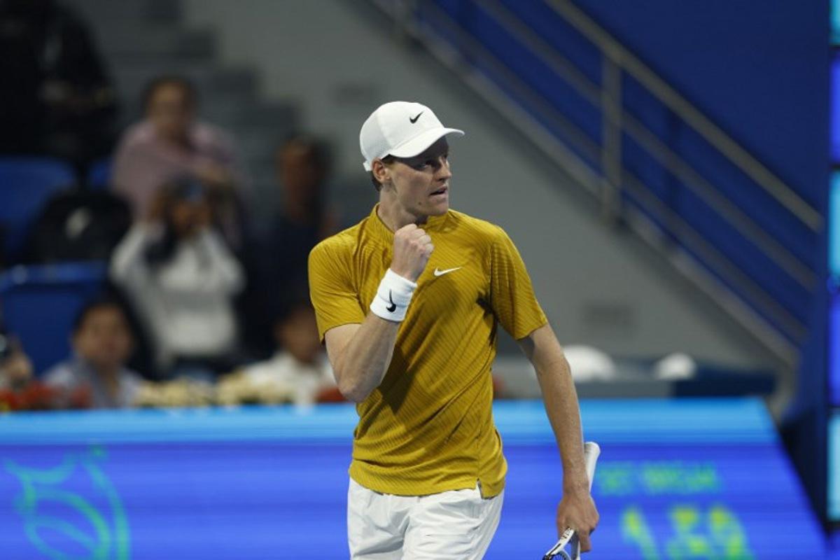 Italy's Jannik Sinner reacts during their men's singles quarterfinal match against Czech Republic's Jakub Mensik at the Qatar Open tennis tournament in Doha on February 19, 2026. Karim JAAFAR / AFP