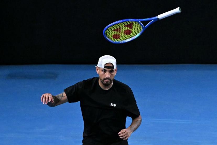 Australia's Nick Kyrgios throws his racket during his men's doubles match against compatriot Jason Kubler and Marc Polmans on day five of the Australian Open tennis tournament in Melbourne on January 22, 2026. WILLIAM WEST / AFP