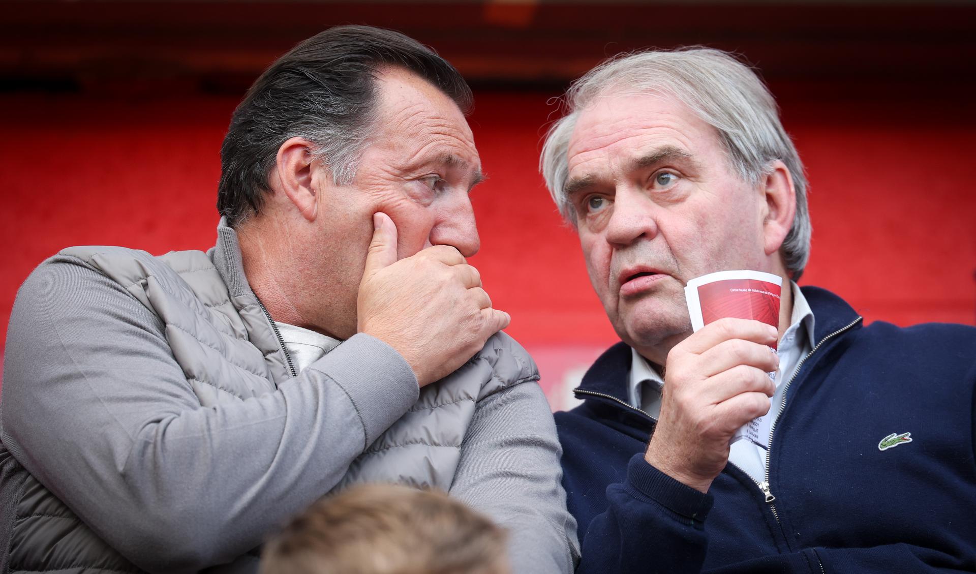 Standard's new sport director Marc Wilmots and Standard's new general manager Pierre Francois pictured at the start of a soccer match between Standard de Liege and FCV Dender EH, Saturday 17 May 2025 in Liege, on day 9 (out of 10) of the Europe Play-offs of the 2024-2025 'Jupiler Pro League' first division of the Belgian championship. BELGA PHOTO VIRGINIE LEFOUR