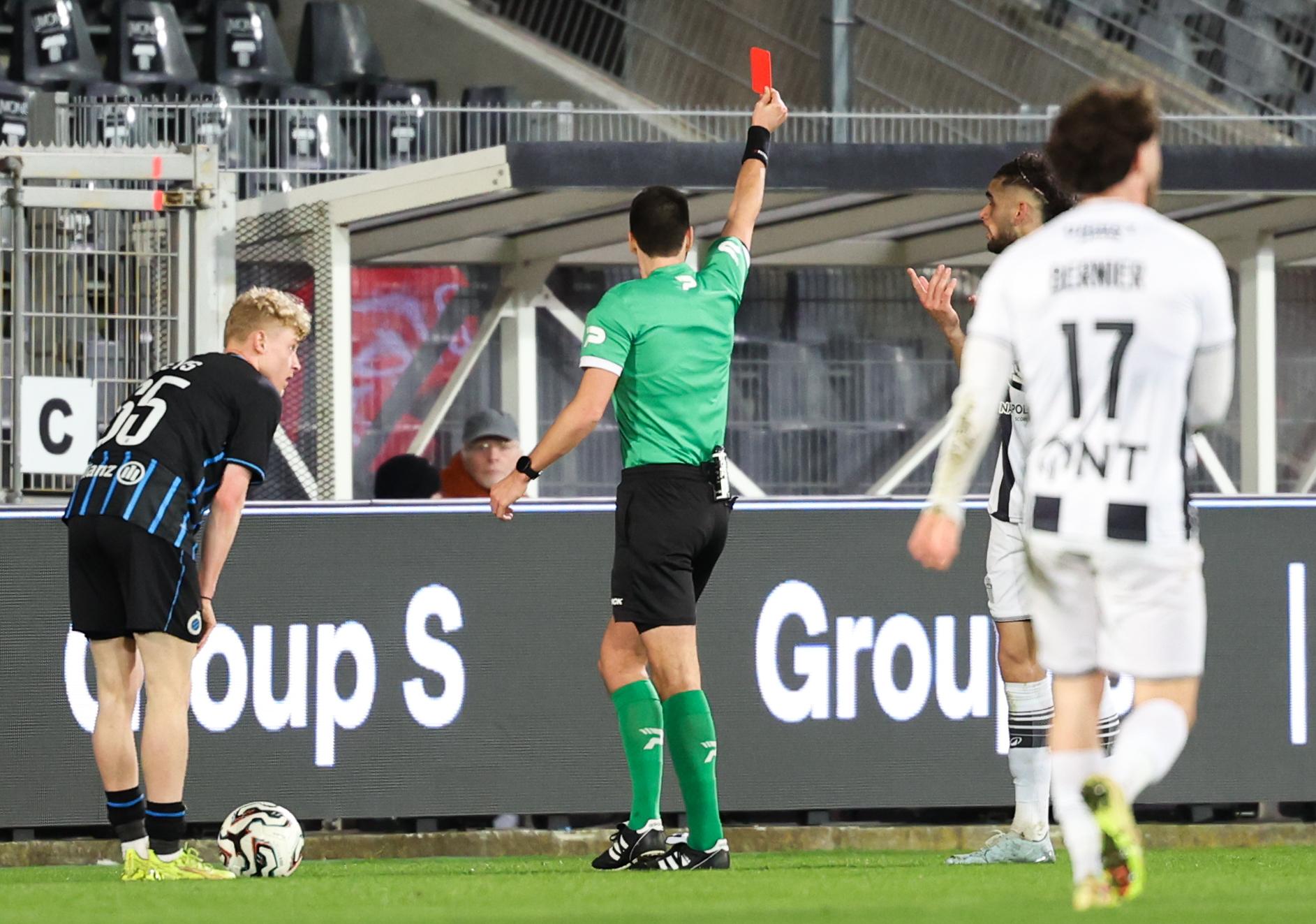 Charleroi's Kevin Van Den Kerkhof receives a red card from the referee during a soccer match between Sporting Charleroi and Club Brugge KV, Sunday 01 March 2026 in Charleroi, on day 27 of the 2025-2026 'Jupiler Pro League' first division of the Belgian championship. BELGA PHOTO VIRGINIE LEFOUR