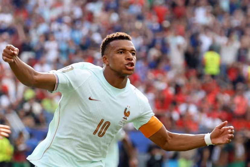 France's forward #10 Kylian Mbappe celebrates scoring his team's first goal during the 2026 World Cup football tournament quarter-final match between France and Morocco at Boston Stadium in Foxborough on July 9, 2026. Odd ANDERSEN / AFP