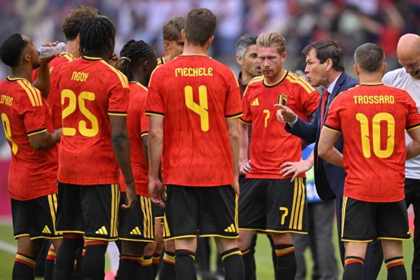 Belgium head coach Rudi Garcia (2ndR) speaks to his players during a cooling break in the international friendly football match between Belgium and Tunisia at the King Baudouin Stadium in Brussels on June 6, 2026. JOHN THYS / AFP
