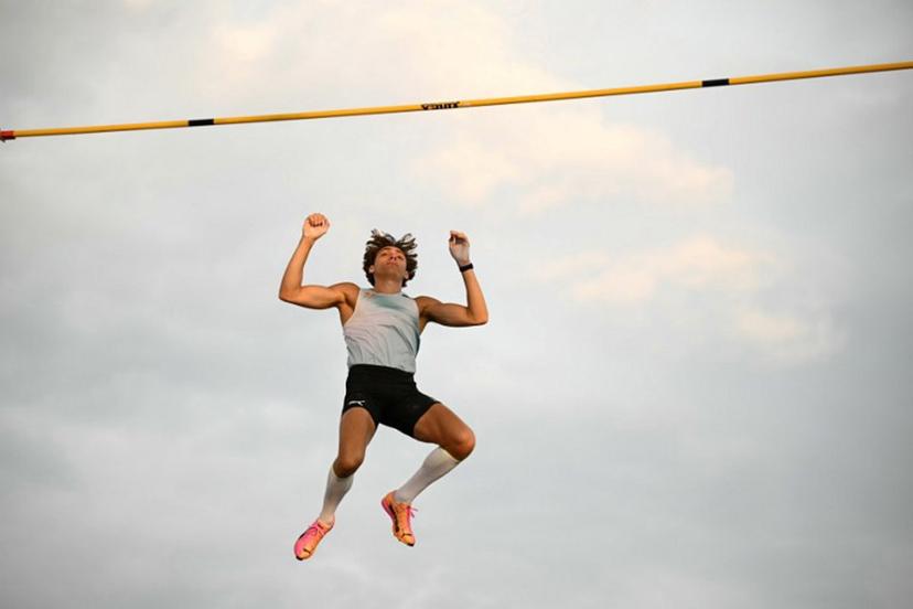 Sweden's Armand Duplantis clears the bar as he competes in the men's Pole Vault during the World Athletics Diamond League athletics meeting at the Stade Olympique de la Pontaise in Lausanne, on August 20, 2026. Fabrice COFFRINI / AFP