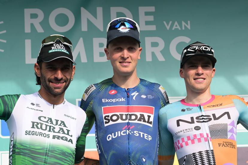 Colombian Fernando Gaviria Rendon of Caja Rural-Seguros RGA, Belgian Tim Merlier of Soudal Quick-Step and Belgian Floris Van Tricht of NSN Cycling Team celebrate on the podium of the 'Ronde Van Limburg' one day cycling race, from Hasselt to Tongeren-Borgloon (178,4 km) on Wednesday 15 April 2026. BELGA PHOTO DAVID PINTENS