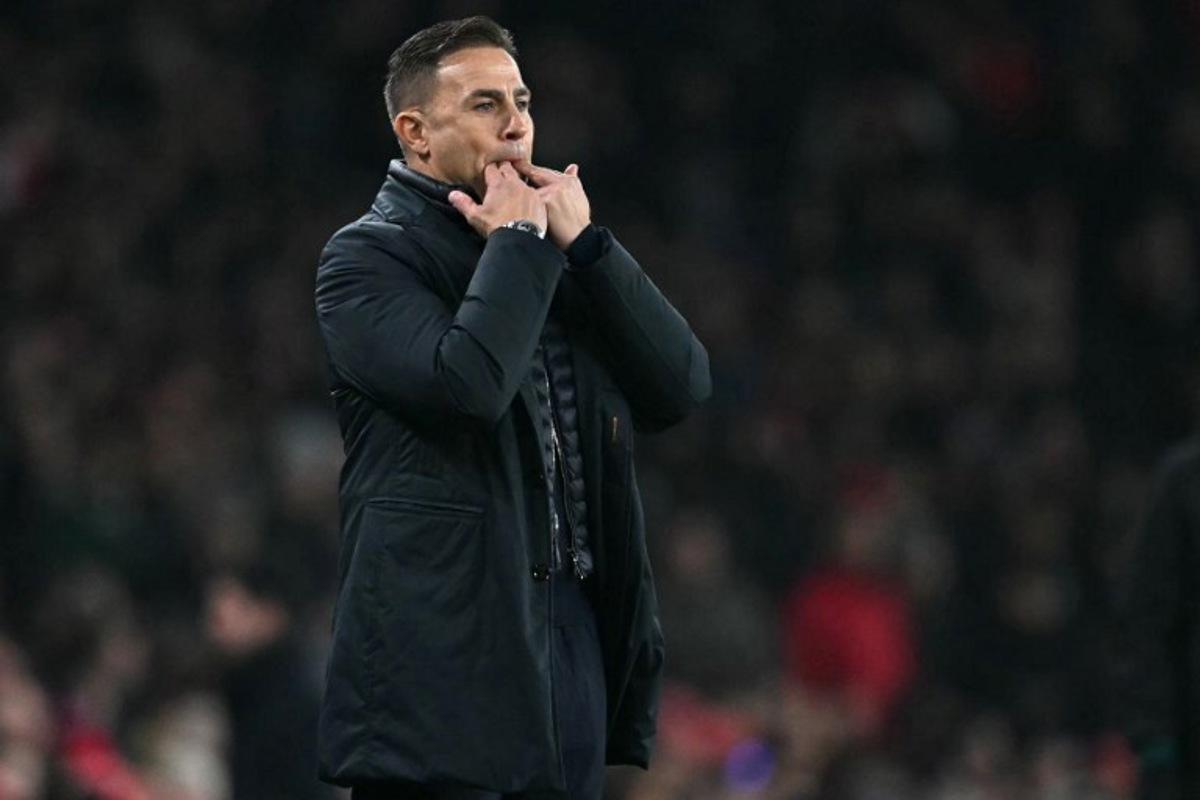 Dinamo Zagreb's Italian head coach Fabio Cannavaro whistles to his players from the touchline during the UEFA Champions League football match between Arsenal and Dinamo Zagreb at the Emirates Stadium in north London on January 22, 2025. JUSTIN TALLIS / AFP