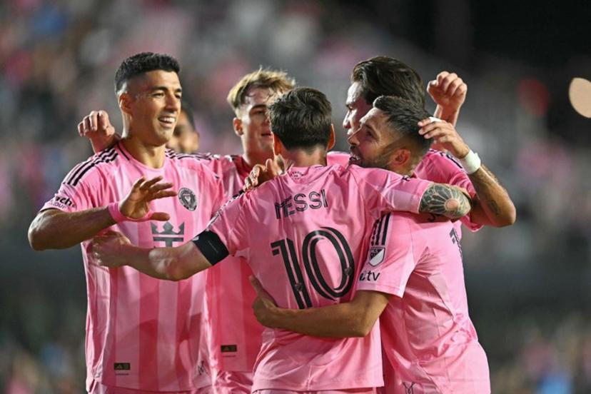 Inter Miami's Argentine forward #10 Lionel Messi celebrates scoring his team's third goal with teammates during the Major League Soccer (MLS) playoff football match between Inter Miami and Nashville SC at Chase Stadium in Fort Lauderdale, Florida on October 24, 2025. Chandan Khanna / AFP