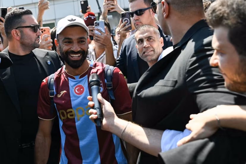 Egyptian forward Mohamed Salah reacts as he arrives at Istanbul Ataturk Airport to complete his transfer to Turkish football club Trabzonspor in Istanbul on August 5, 2026. Ozan KOSE / AFP