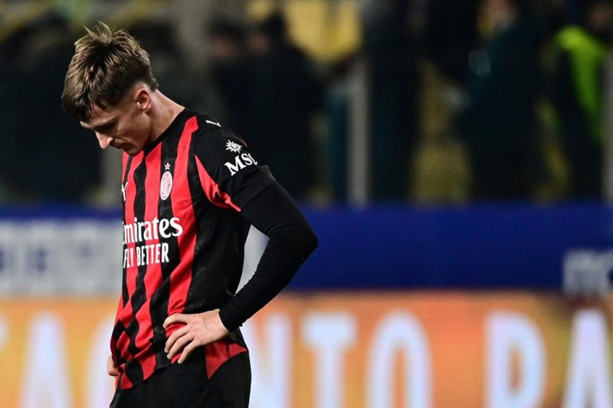 AC Milan's Belgian midfielder #56 Alexis Saelemaekers reacts at the end of the Italian Serie A football match between Parma and AC Milan at the San Siro Stadium in Parma, northern Italy, on November 8, 2025. Parma and AC Milan equalised 2 - 2. Piero CRUCIATTI / AFP