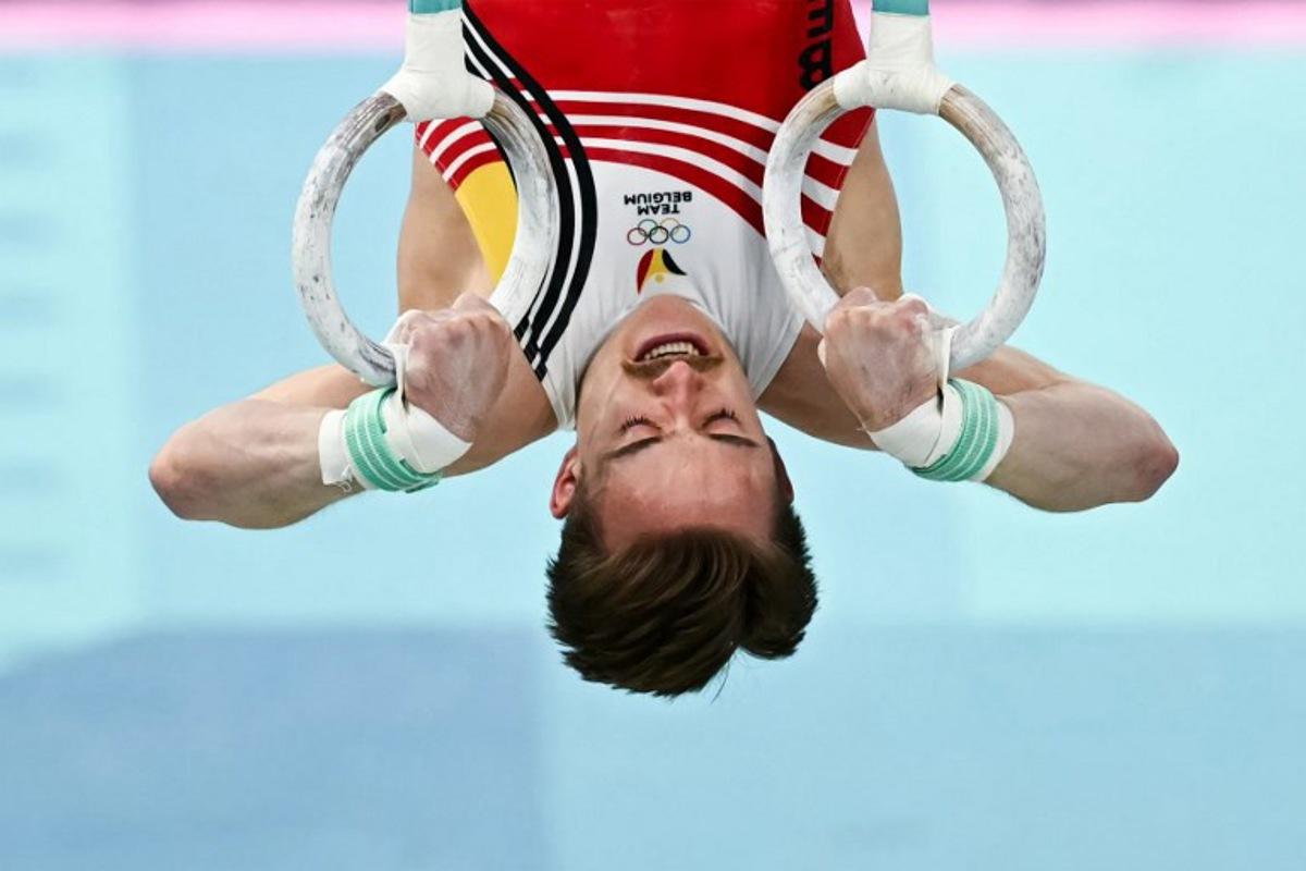 Belgium's Glen Cuyle competes in the artistic gymnastics men's rings final during the Paris 2024 Olympic Games at the Bercy Arena in Paris, on August 4, 2024. Paul ELLIS / AFP