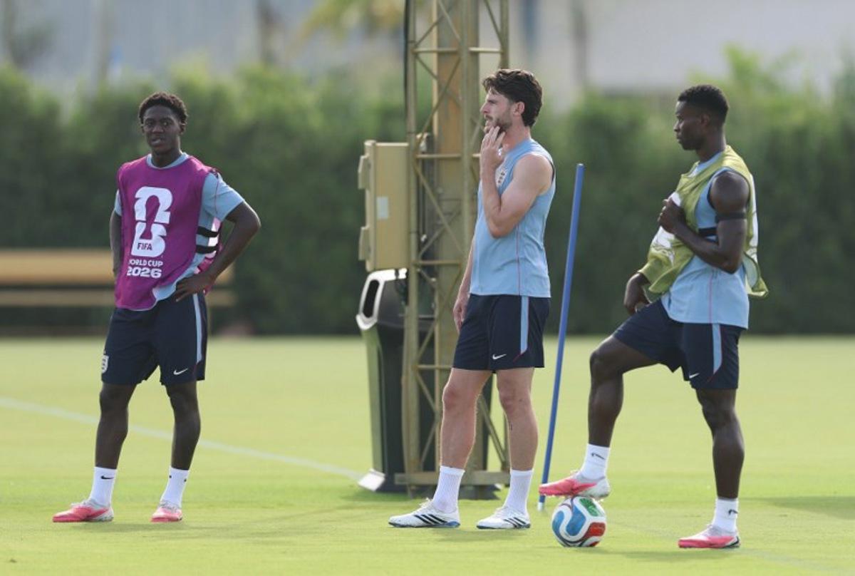 England's midfielders #16 Kobbie Mainoo, #04 Declan Rice and defender #06 Marc Guehi attend a training session on the eve of the 2026 World Cup quarter-final football match between Norway and England, Inter Miami CF Stadium in Fort Lauderdale on July 10, 2026. PATRICIA DE MELO MOREIRA / AFP