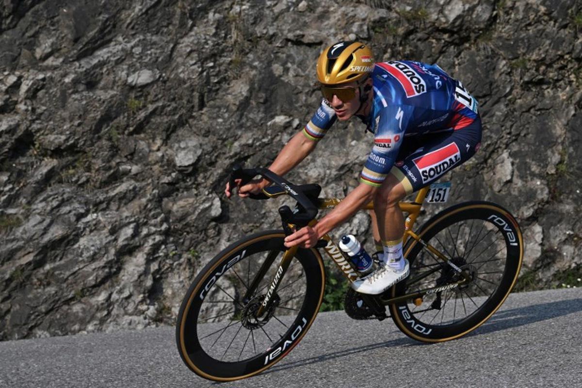 Soudal Quick-Step's Belgian rider Remco Evenepoel cycles in the final ascent to Bergamo during the 119th edition of the Giro di Lombardia (Tour of Lombardy), a 238km cycling race from Como to Bergamo on October 11, 2025. Dario BELINGHERI / POOL / AFP