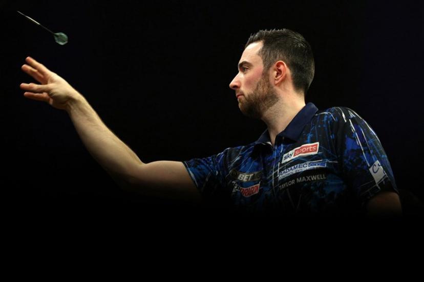 England's Luke Humphries competes during his quarter-final darts match against England's Luke Littler on Night 1 of the PDC Premier League, at the Utilita Arena in Cardiff, south Wales on February 1, 2024. Adrian DENNIS / AFP