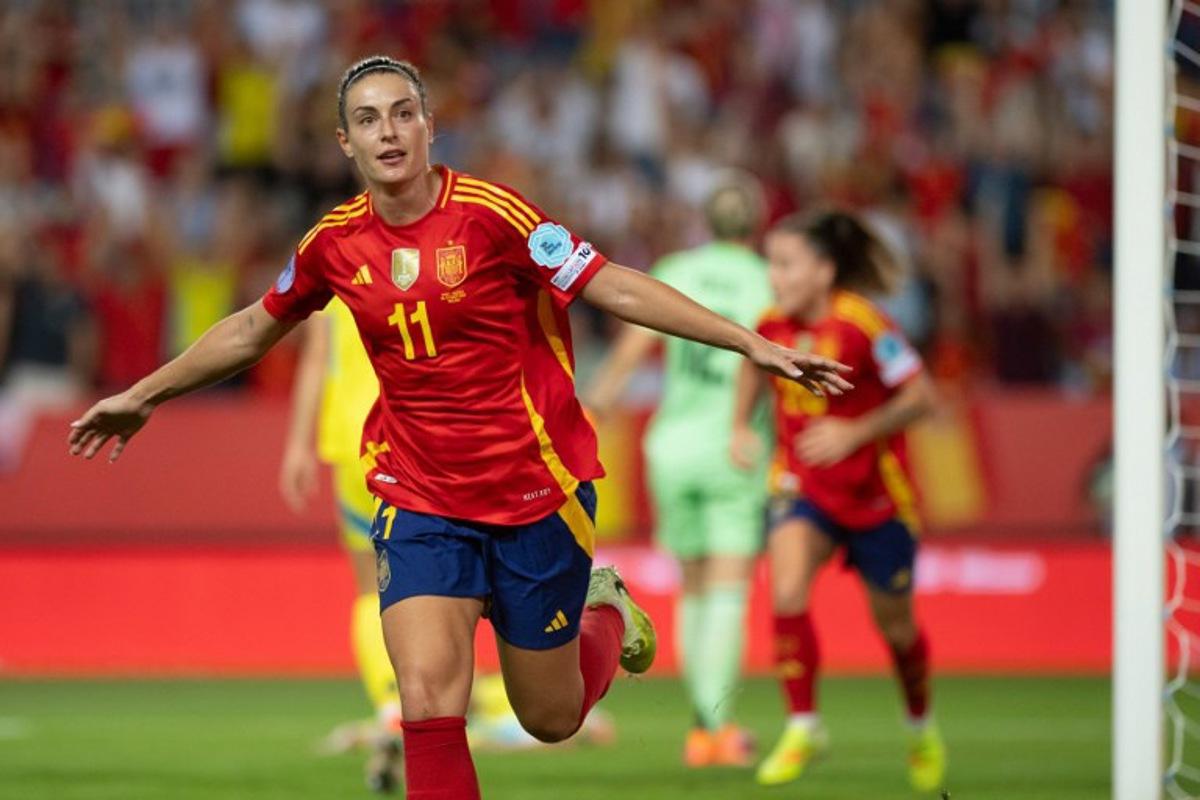 Spain's midfielder #11 Alexia Putellas celebrates scoring her team's third goal during the UEFA Women's Nations League semi-final football match between Spain and Sweden at La Rosaleda stadium in Malaga on October 24, 2025.  JORGE GUERRERO / AFP